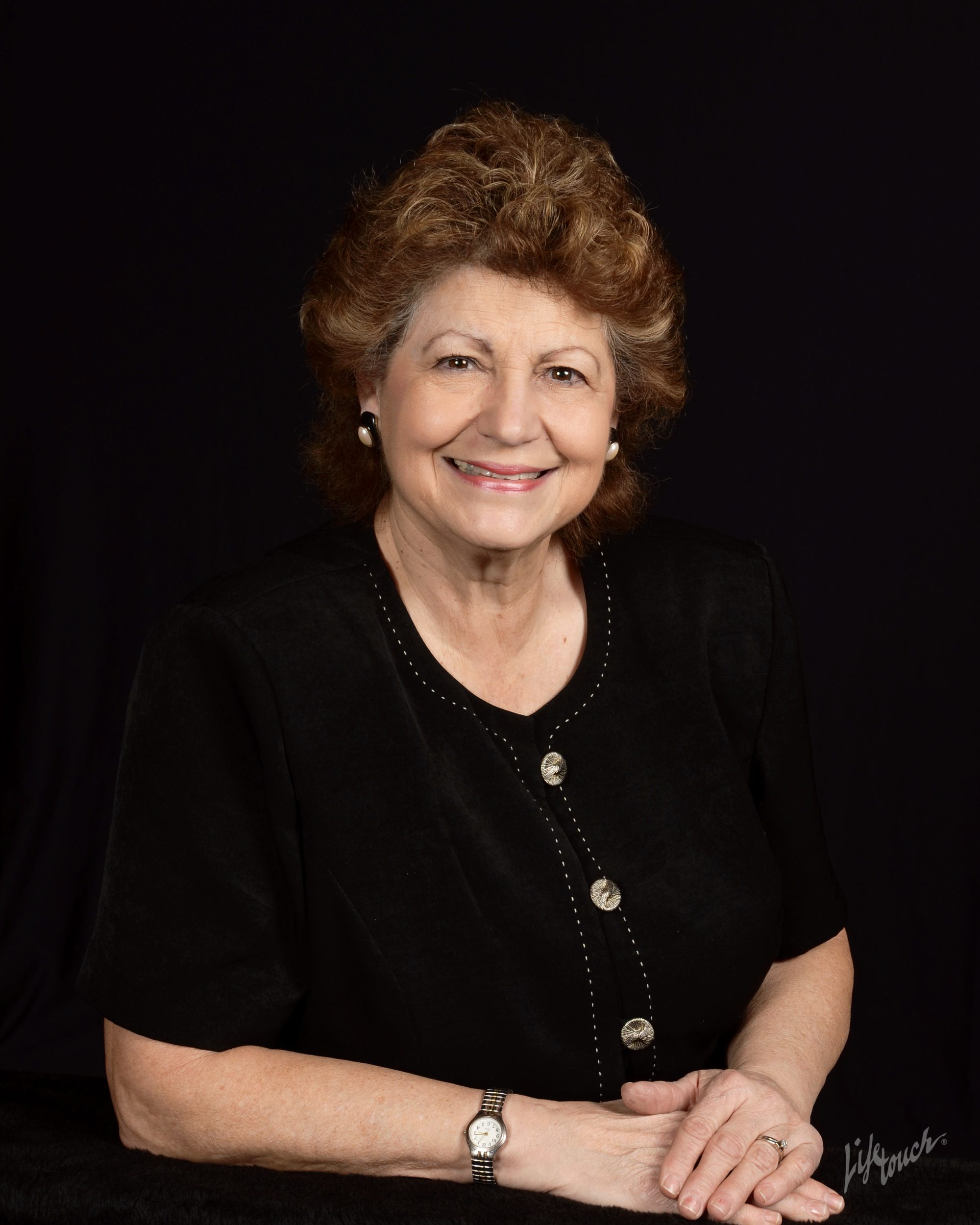 Smiling Woman In A Black Shirt